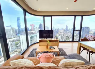 Luxurious living room with panoramic city views and modern decor