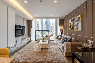 Luxurious modern living room with city view, elegant decor, and cozy ambiance.