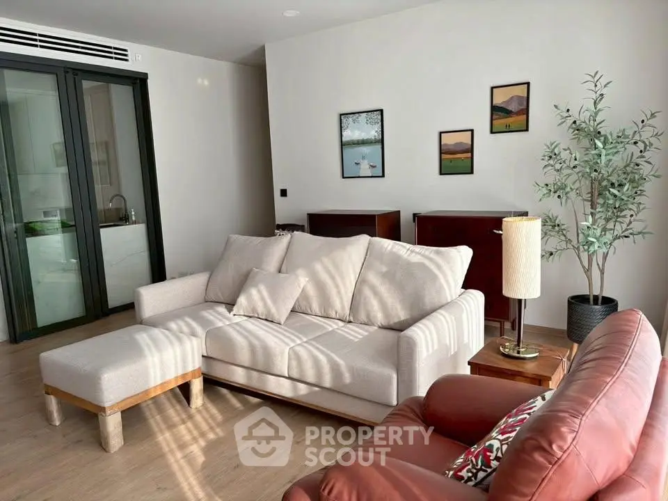 Modern living room with stylish furniture and natural light