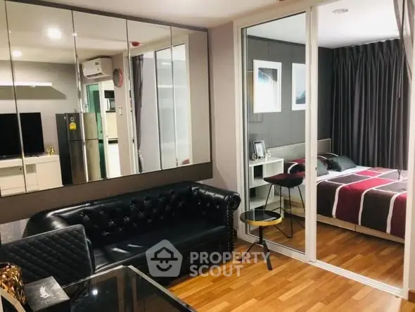 Modern apartment interior with stylish living room and cozy bedroom