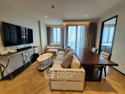 Luxurious modern living room with elegant furniture and large windows