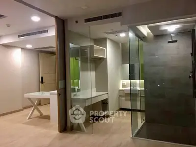 Modern interior with glass shower and sleek design, perfect for contemporary living.