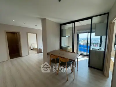 Spacious modern apartment with open layout and city view balcony
