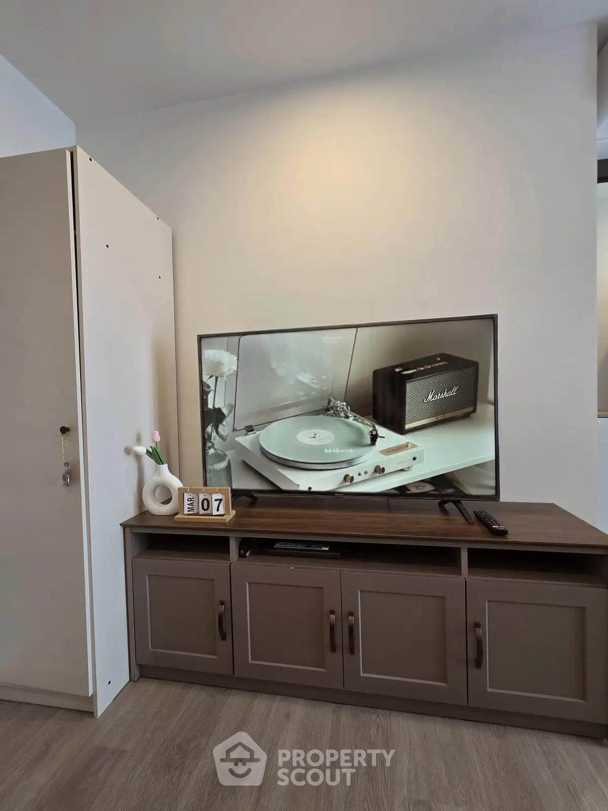 Modern living room with stylish TV stand and sleek decor
