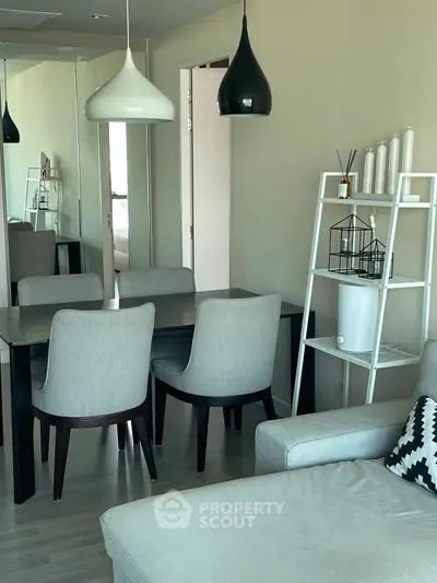 Modern living room with stylish dining area and contemporary decor