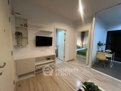 Modern apartment interior with sleek living room and cozy bedroom