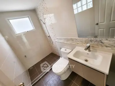 Modern bathroom with sleek fixtures and elegant tile design