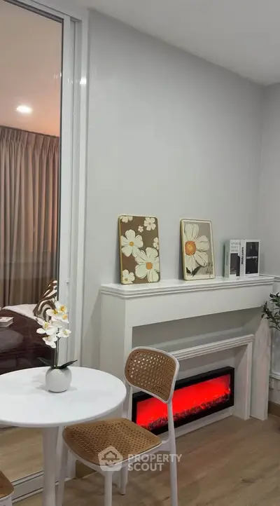 Cozy modern living room with stylish decor and electric fireplace