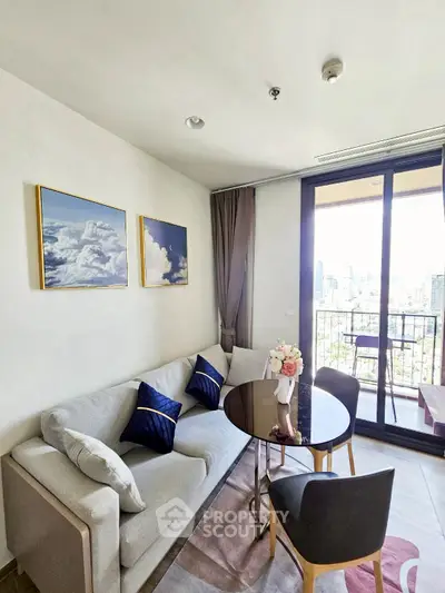 Modern living room with balcony and city view, featuring stylish decor and cozy seating area.