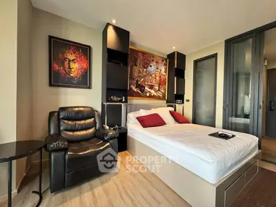 Modern bedroom with stylish decor and comfortable seating