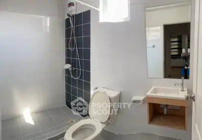 Modern bathroom with sleek tiles and contemporary fixtures