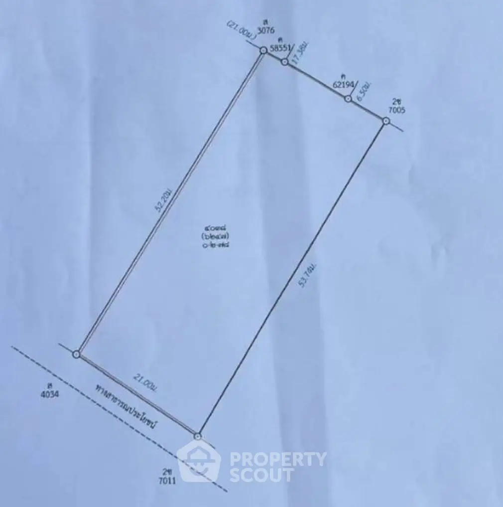 Detailed schematic plan of a property with precise measurements and boundary lines.