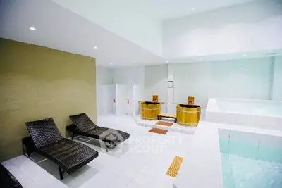 Luxurious spa area with modern design and relaxation loungers