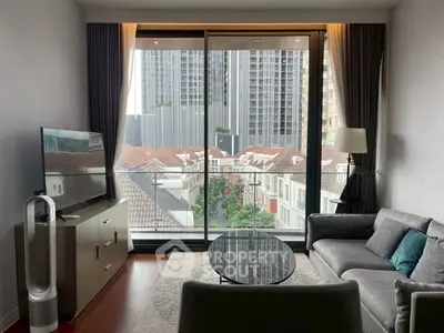 Modern living room with city view and sleek furniture