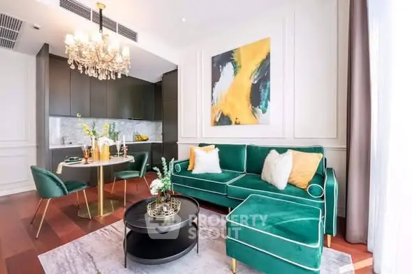 Luxurious living room with elegant green sofa and modern kitchen in open layout