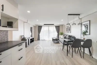 Spacious modern living room with dining area and stylish decor