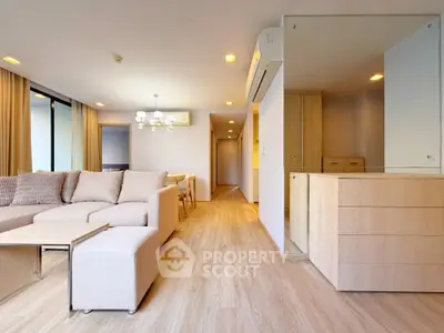 Spacious modern living room with elegant decor and natural light
