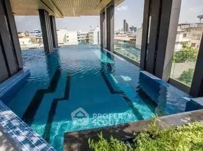 Luxurious rooftop infinity pool with stunning city views, perfect for relaxation and leisure.