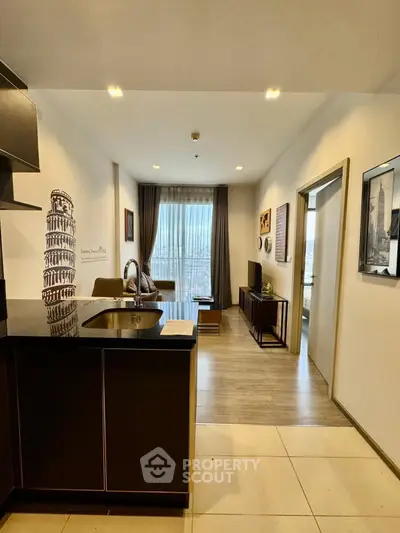 Modern open-layout living room with stylish decor and kitchen island