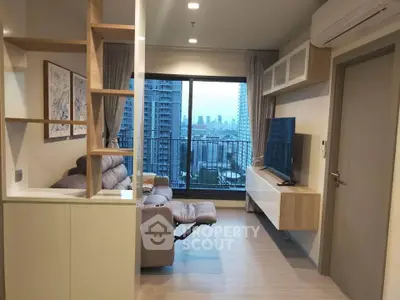 Modern living room with city view, featuring sleek furniture and large window.