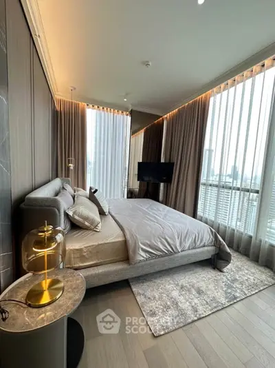 Luxurious bedroom with panoramic city view and elegant decor