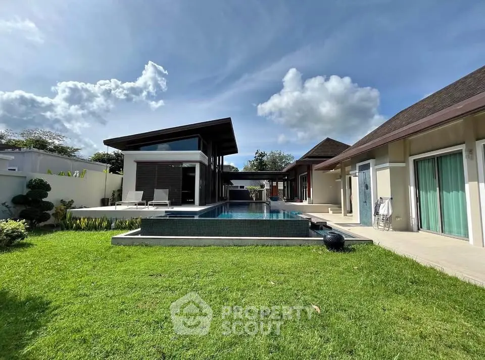 Luxurious modern villa with private pool and lush garden, perfect for serene living.