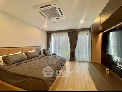 Luxurious bedroom with modern design and large window view