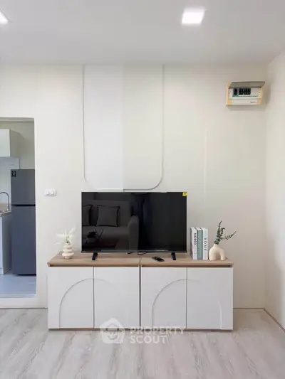 Modern living room with sleek TV stand and contemporary decor