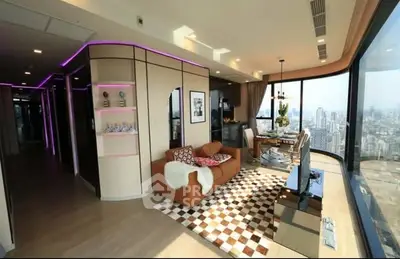 Luxurious corner unit living room with panoramic city views and modern decor.
