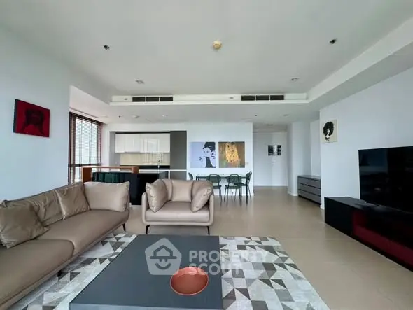 Spacious modern living room with open kitchen and stylish decor