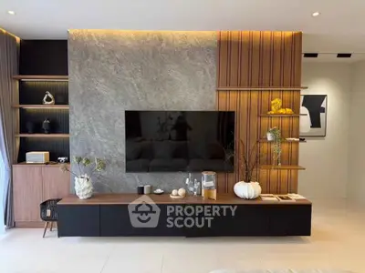 Modern living room with stylish TV wall unit and elegant decor