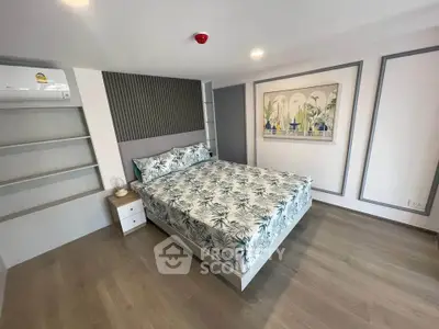 Modern bedroom with stylish decor and spacious layout in a contemporary apartment.