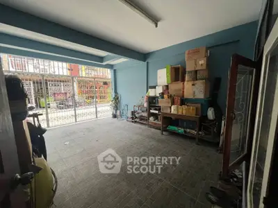 Spacious storage area with ample natural light and organized shelving.