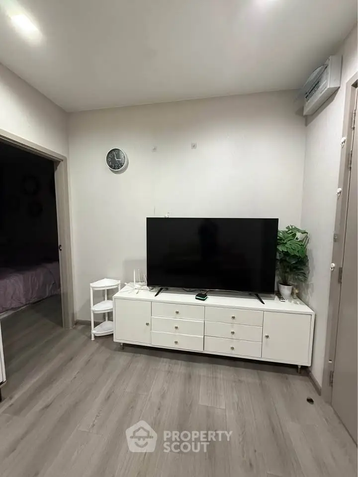 Modern living room with sleek TV setup and stylish decor