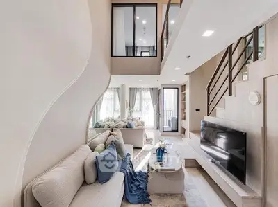 Luxurious modern bedroom with sleek design and ample natural light.