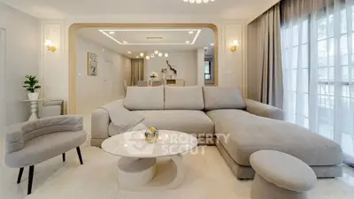 Luxurious modern living room with elegant furniture and natural light