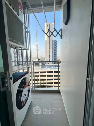 Charming balcony with city view, perfect for relaxation and enjoying urban skyline.