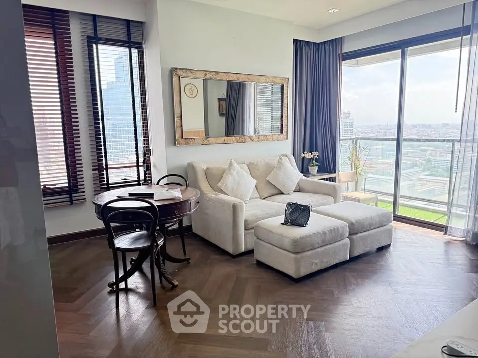 Elegant living room with city view, featuring cozy sofa and stylish decor, perfect for urban living.