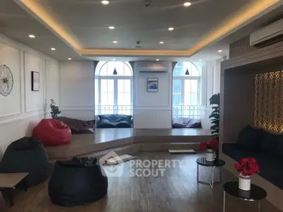 Stylish modern living room with cozy seating and elegant lighting