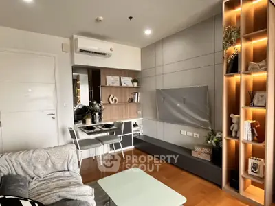 Modern living room with sleek furniture and built-in shelving