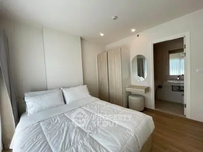 Modern bedroom with ensuite bathroom and minimalist decor