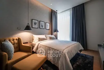 Luxurious bedroom with elegant decor and natural light