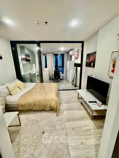Modern studio apartment with cozy bedroom and stylish decor