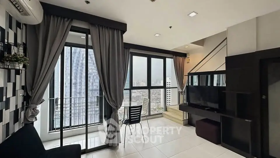 Modern living room with large windows and city view, featuring sleek furniture and elegant curtains.