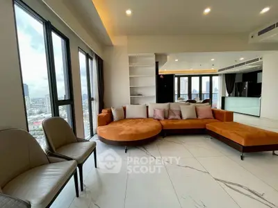 Spacious modern living room with panoramic city views and stylish orange sectional sofa.