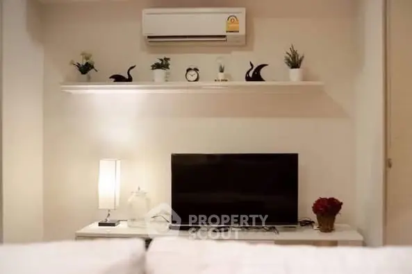 Cozy living room with modern TV setup and elegant decor