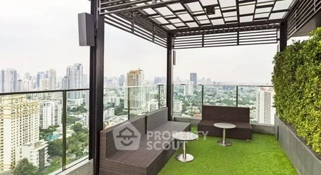 Stunning rooftop terrace with panoramic city views and modern seating area.