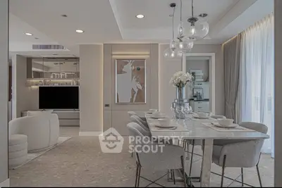 Luxurious modern living and dining area with elegant decor and natural light
