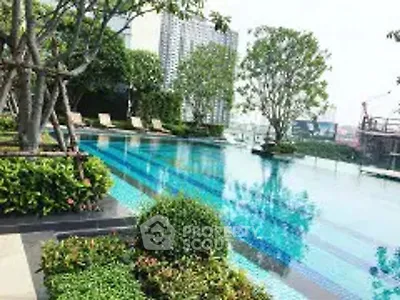 Luxurious rooftop pool with city skyline view and lush greenery