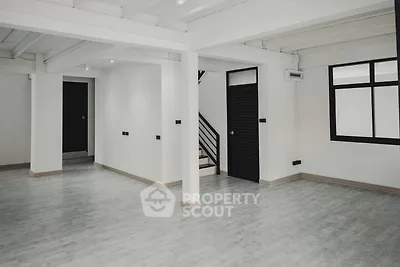 Spacious and modern open-plan living area with ample natural light, sleek flooring, and a versatile layout ideal for customization in a contemporary home.